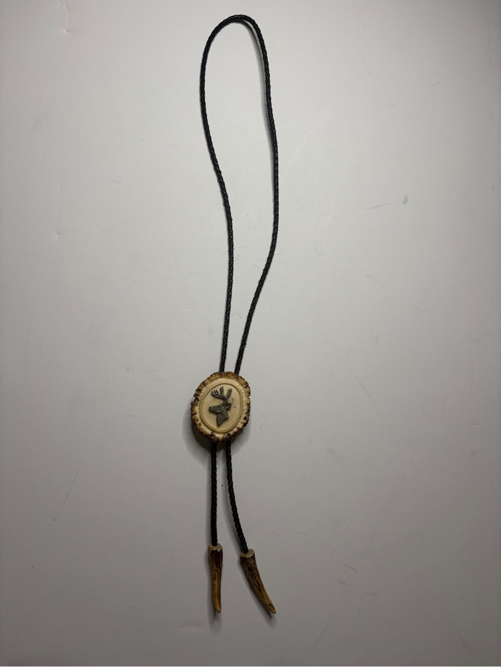 Vintage antler burr bolo tie black leather braided cord antler details western